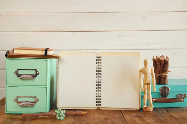 Artist supplies on wooden table — Stock Photo, Image