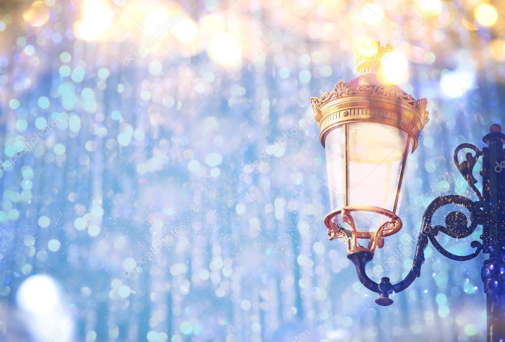 Abstract image of Christmas street lights with glitter overlay