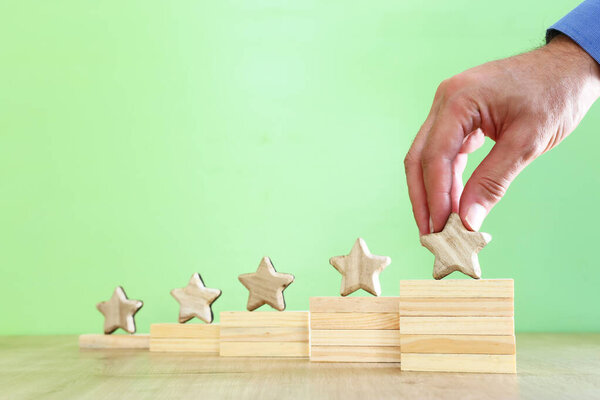 concept image of setting a five star goal. increase rating or ranking, evaluation and classification idea