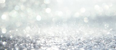 Pırıl pırıl ışıklar arka plan. Gümüş, altın ve beyaz. & Odaklanma