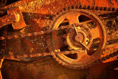 Paslı metal dişli tekerleğin soyut fotoğrafı