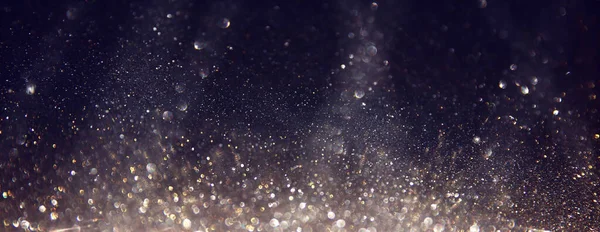 Achtergrond Van Abstracte Glitterlichten Zilver Goud Zwart Geconcentreerd — Stockfoto