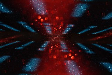 Soyut mavi, kırmızı ve siyah parıltılı ışıkların arkaplanı. Odaklanamadı
