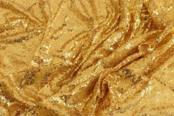 background of beautiful gold sequins fabric