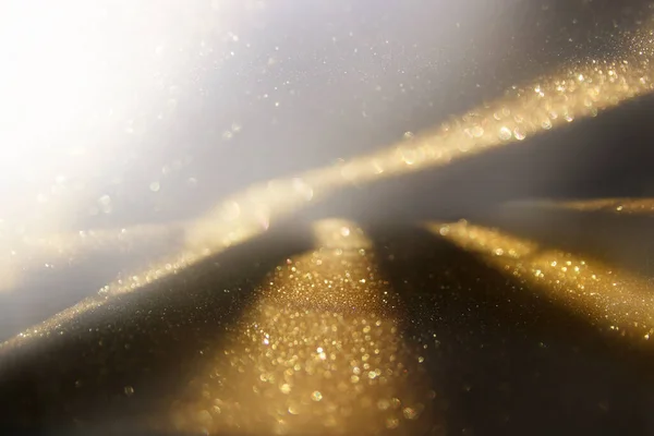Φόντο Αφηρημένα Χρυσά Και Μαύρα Φώτα Glitter Δεφοκεντρικός — Φωτογραφία Αρχείου