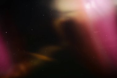 Retro filmin arka planı aşırı derecede, çizik, toz ve ışık sızıntılı görüntü