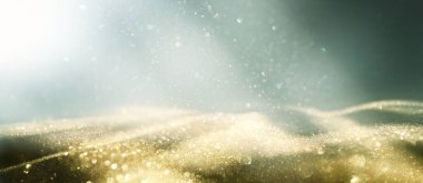 Pırıl pırıl ışıklar arka plan. Gümüş, altın ve beyaz. Odaklanmamış