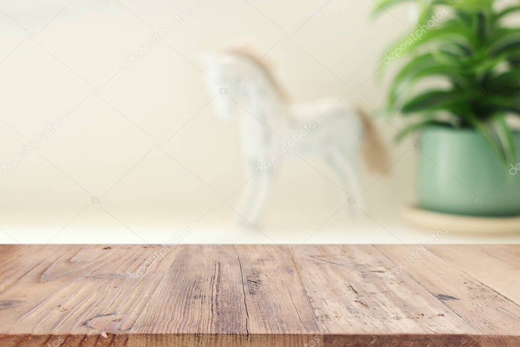 empty table board and defocused vintage woman toilet desk background. product display concept