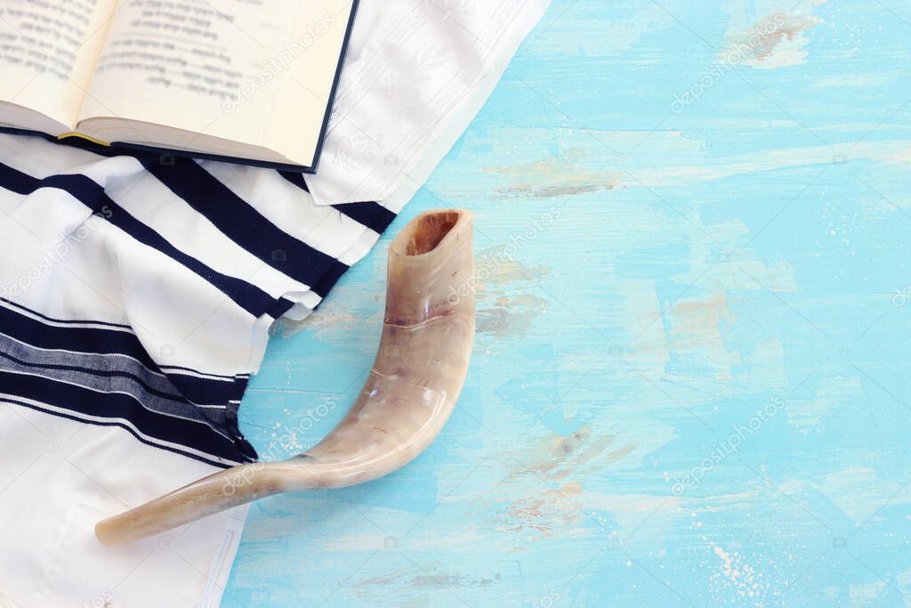 religion image of shofar (horn) on white prayer talit. Rosh hashanah (jewish New Year holiday), Shabbat and Yom kippur concept