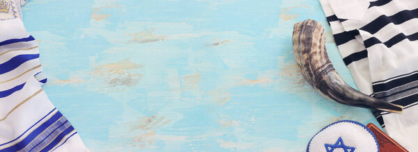 religion image of shofar (horn) on white prayer talit. Rosh hashanah (jewish New Year holiday), Shabbat and Yom kippur concept