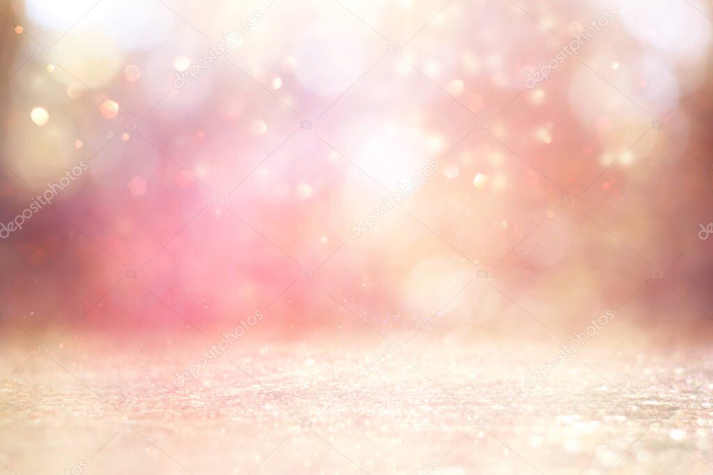 background of glitter vintage lights . silver, gold, pink and white. de-focused. banner