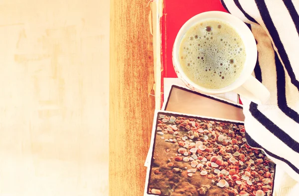 Top view of cup of coffe and stack of photos — Stock Photo, Image