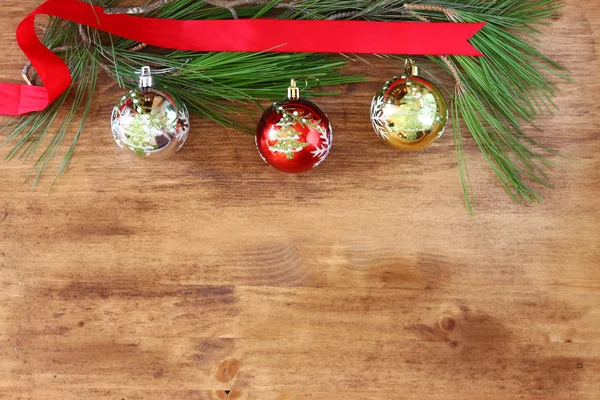 Christmas decoration on a woodwn board — Stock Photo, Image