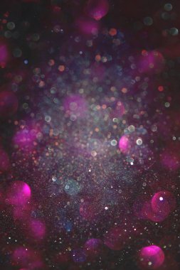 Glitter vintage ışıklar arka plan. mavi ve mor. defocused
