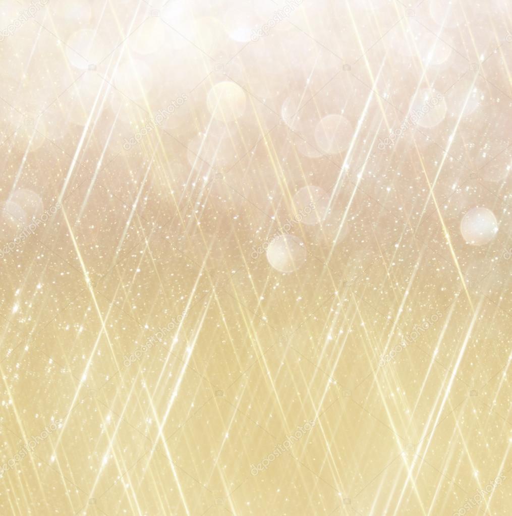 Abstract gold background with copy space . gliiter bokeh lights