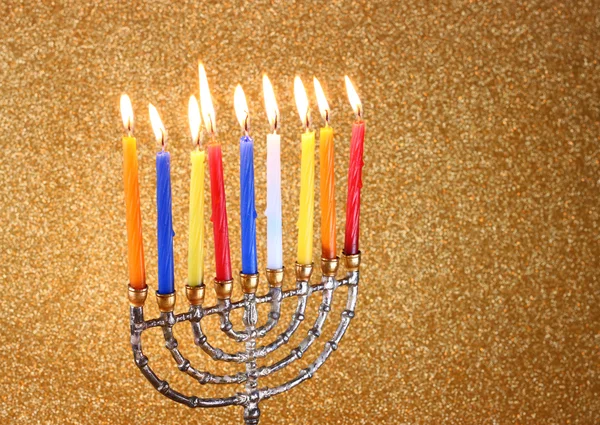 Menora met fotokaders en glitter licht achtergrond. Hanukkah concept — Stockfoto