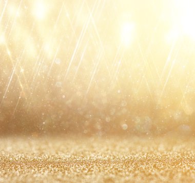 Glitter vintage ışıklar arka plan. akmak altın arka plan. defocused