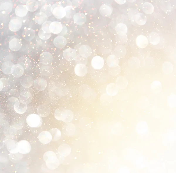 Glitter vintage ljus bakgrund. abstrakt guld bakgrund. defocused — Stockfoto