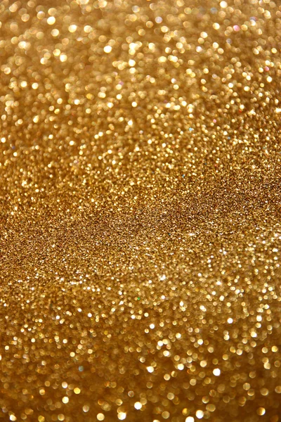 キラキラ ビンテージ ライトの背景。抽象的なゴールドの背景。デフォーカス — ストック写真