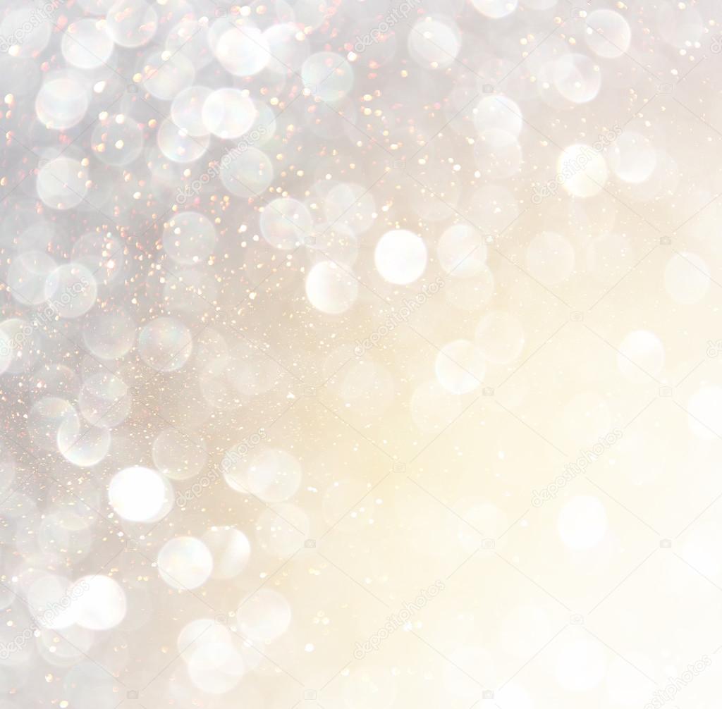 Glitter vintage lights background. abstract gold background . defocused