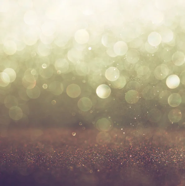 Glitter vintage lights background. light gold and black. defocused. — Stock Photo, Image