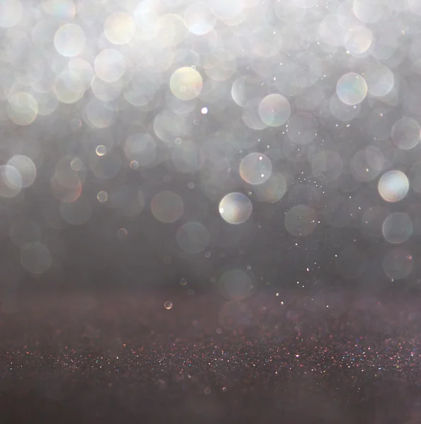 Glitter vintage lights background. light gold and black. defocused. — Stock Photo, Image