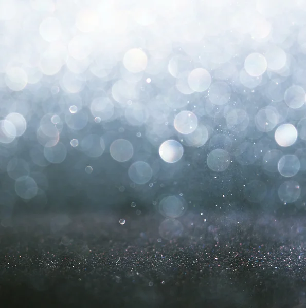 Glitter vintage lights background. light silver and black. defocused. — Stock Photo, Image