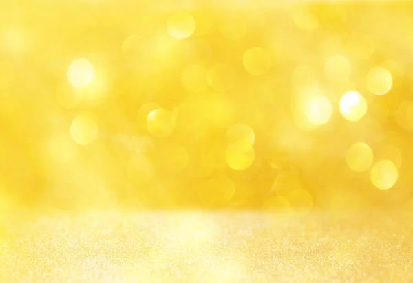 Bright golden bokeh lights and texture. defocused abstract background — Stock Photo, Image