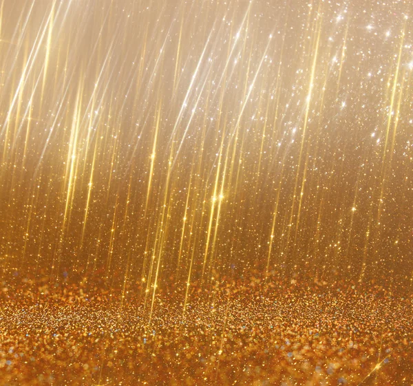 Ljusa golden bokeh lampor och textur. defocused abstrakt bakgrund — Stockfoto