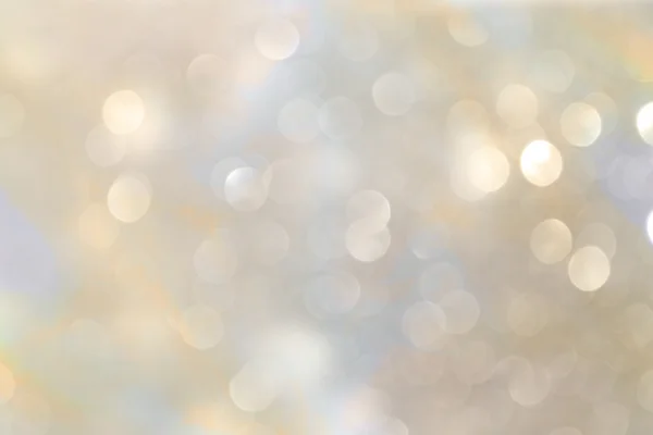 Witte en zilveren abstracte bokeh lichten. gedeconcentreerde achtergrond — Stockfoto