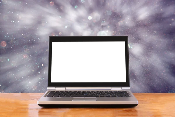 Laptop over wooden table with empty screen ready for mock up and blurry bokeh background — Stock Photo, Image