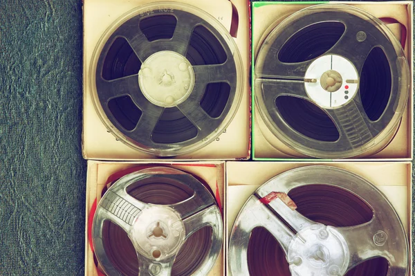 Top view of old sound recording tape, reel to reel type and box. — Stock Photo, Image