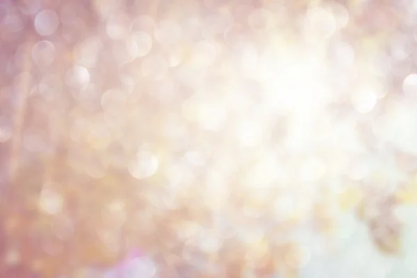 Glitter vintage lights background. gold, silver, and white. de-focused. — Stock Photo, Image