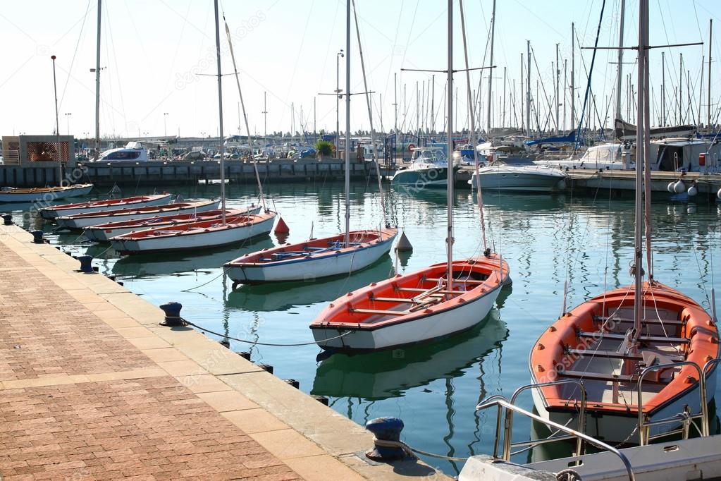 Romantic marina with yachts. retro filtered image