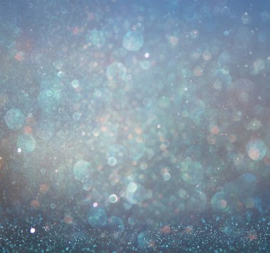 Glitter vintage ışıklar arka plan. Altın, gümüş, mavi ve siyah. de-odaklı.
