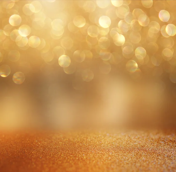 Abstrakter Hintergrund aus goldenen Bokeh-Lichtern. — Stockfoto