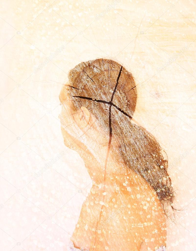 Double exposure photo of young woman and tree log texture, retro style image
