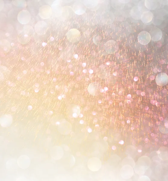 Glitter vintage ljus bakgrund. abstrakt guld bakgrund. defocused — Stockfoto
