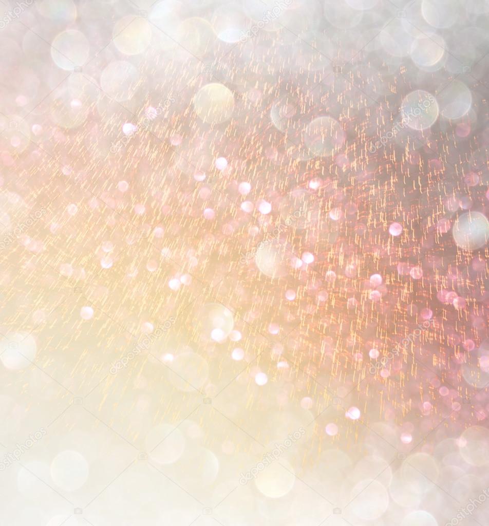 Glitter vintage lights background. abstract gold background . defocused