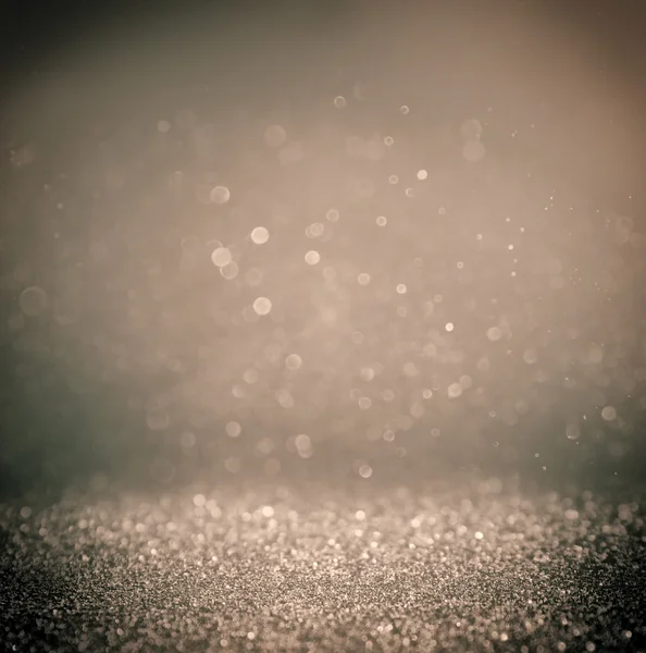 Scuro glitter vintage luci di sfondo. argento chiaro e nero. sfocato . — Foto Stock