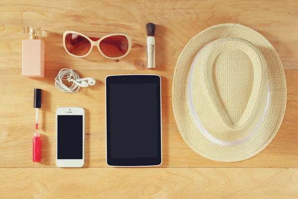 Top view image of woman accessories , different objects on wooden background. — Stock Photo, Image