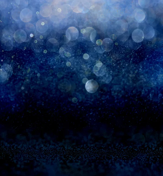 Glitter vintage lights background with light burst . silver, blue and white. de-focused. — Stock Photo, Image