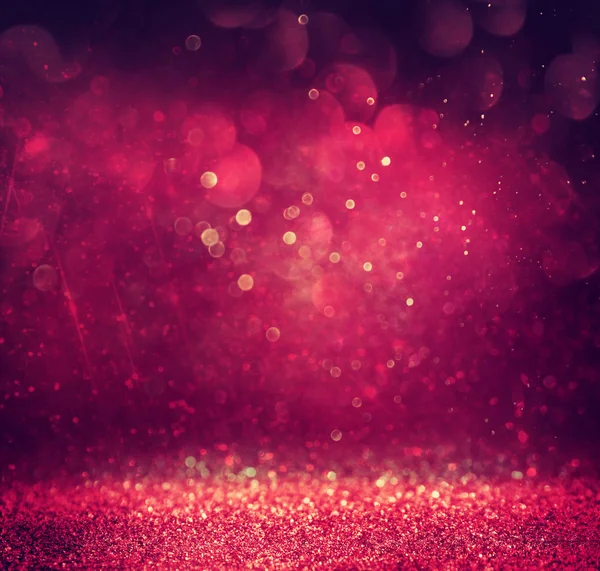 Csillogó vintage fények háttér. arany, vörös és lila. defocused — Stock Fotó