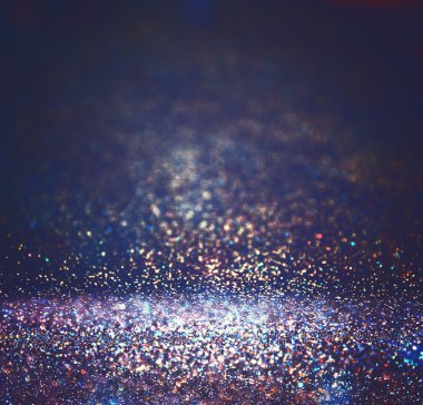 Glitter vintage ışıklar arka plan. ışık gümüş, mor, mavi, altın rengi ve siyah. defocused.