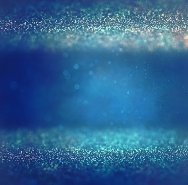 Glitter vintage lights background. light silver, purple, blue, gold and black. defocused. — Stock Photo, Image