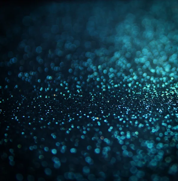 Glitter vintage lights background. light silver, blue and black. defocused. — Stock Photo, Image