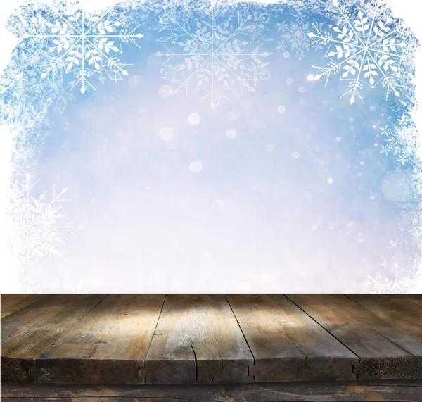 Wood table with snowflake frame — Stock Photo, Image