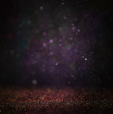 Glitter vintage ışıklar arka plan. ışık gümüş, altın, mor ve siyah. defocused.