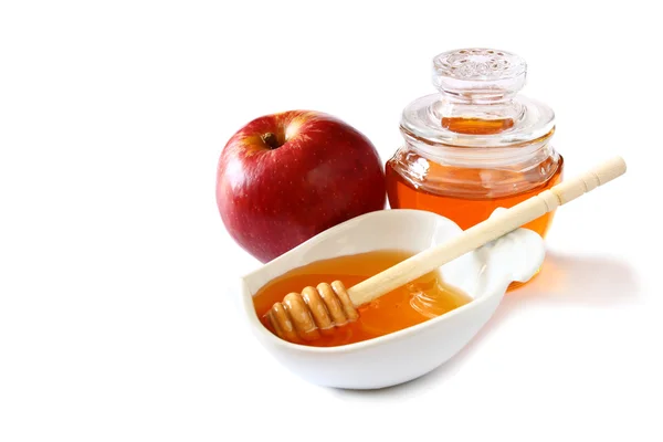 Ильхашана (еврейский праздник) концепция - мед и красное яблоко изолированы на белом. традиционные праздничные . — стоковое фото