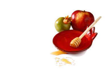 rosh hashanah (jewesh holiday) concept - honey and red apple isolated on white. traditional holiday symbols.